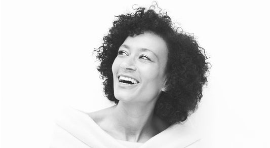 Lifestyle image of a woman in black and white