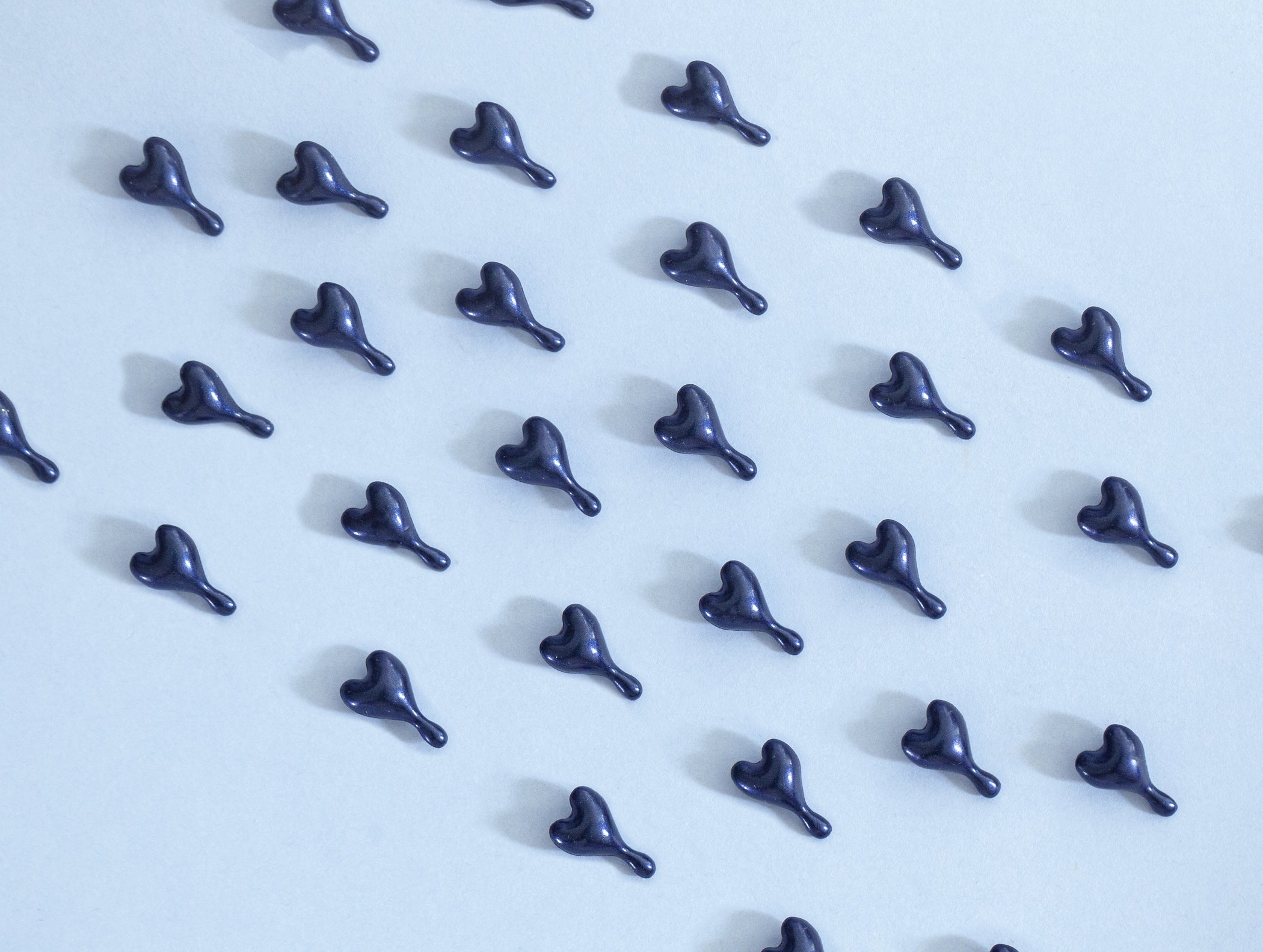 Image of OSKIA's Super R Capsules on blue paper